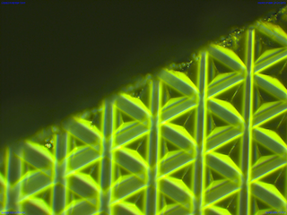 Inspection of retroreflector-pattern at 200x: protruding pyramids